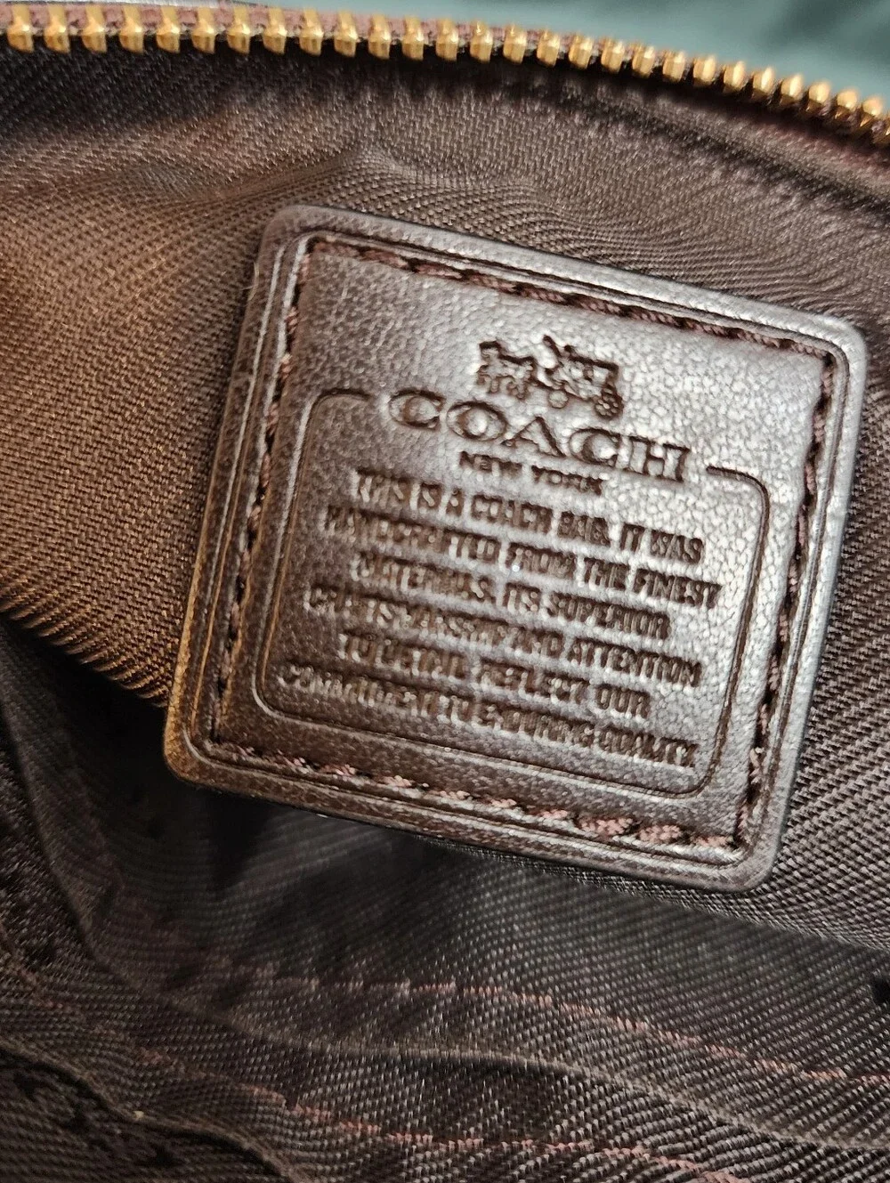 COACH Pebbled Leather Double Corner Zip Bag Bronze/Brown WristletThis is a lit